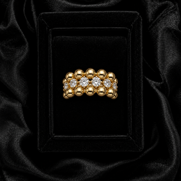 Vintage-inspired gold beaded cubic zirconia ring displayed in a black velvet jewelry box