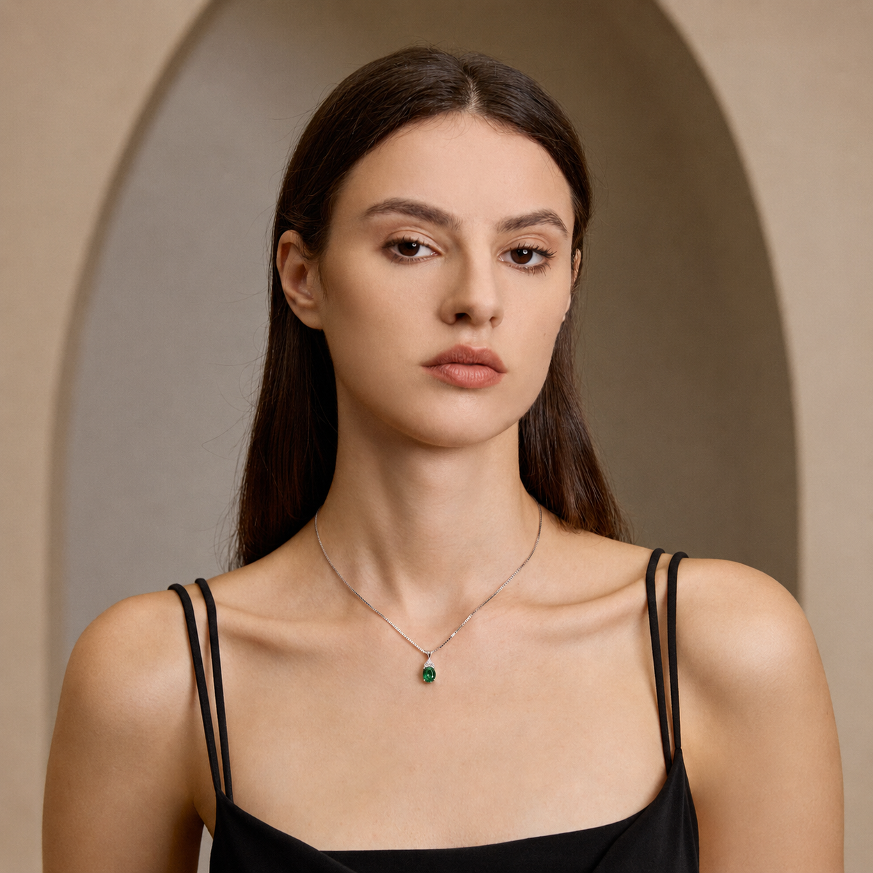 Model wearing Starlit Garden emerald necklace with moissanite accents