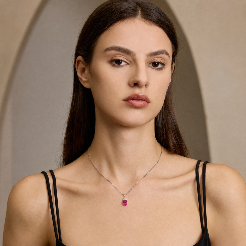 Model wearing Starlit Garden vivid pink sapphire necklace with moissanite accents