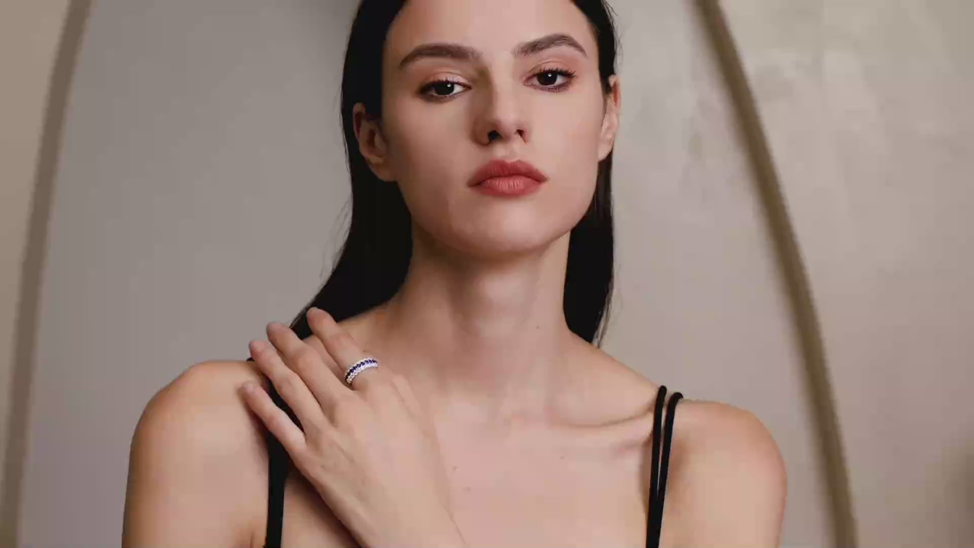 Model wearing the Blue Sapphire & Moissanite Curved Band Ring, showing the real fit, sparkle, and elegant hand styling.