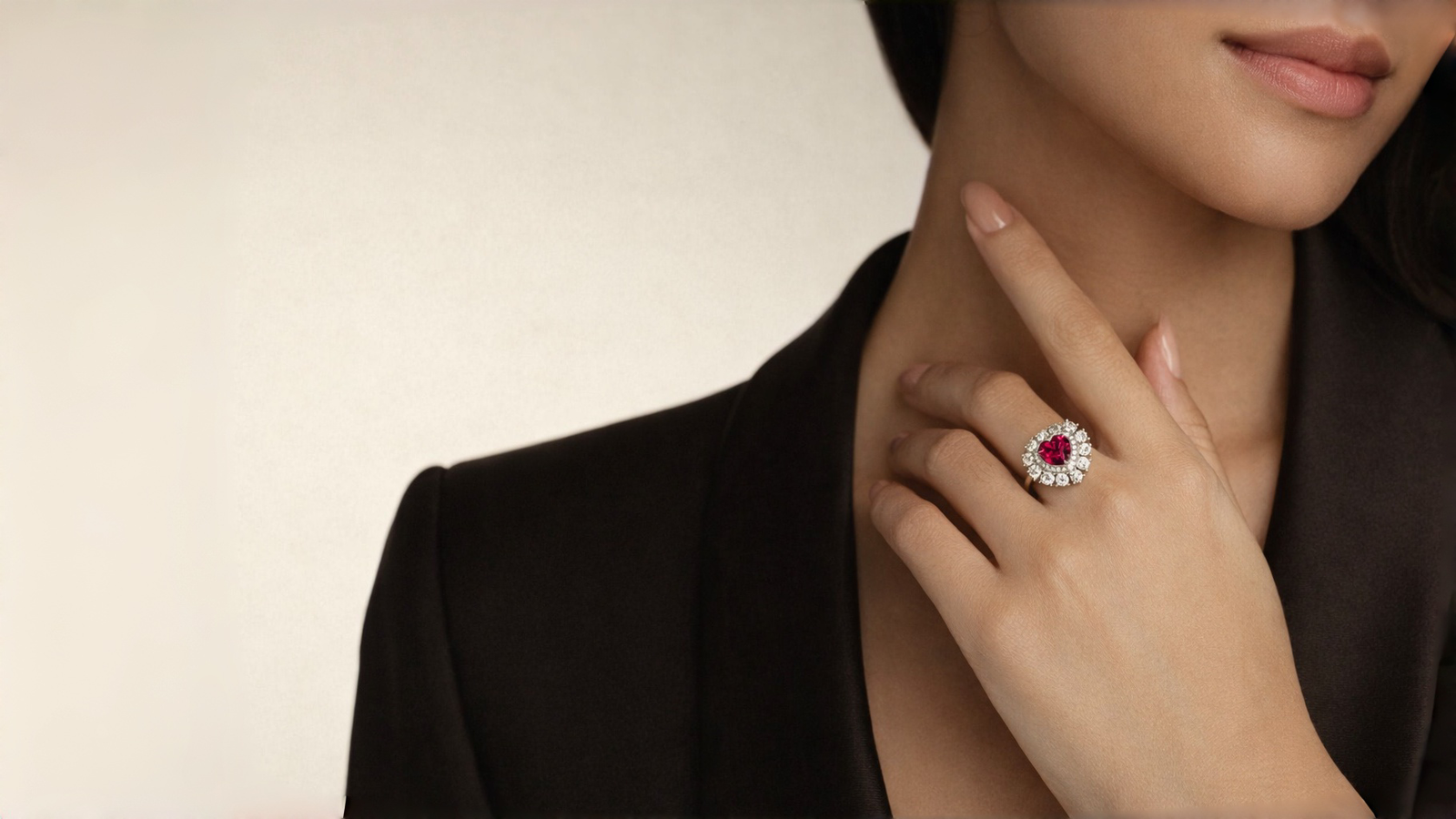Woman wearing a Dellyrica heart-shaped ruby ring as a romantic surprise ring gift