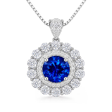 Moon Halo Blue Sapphire Necklace with a lab-grown blue sapphire and moissanite halo in rhodium-plated sterling silver