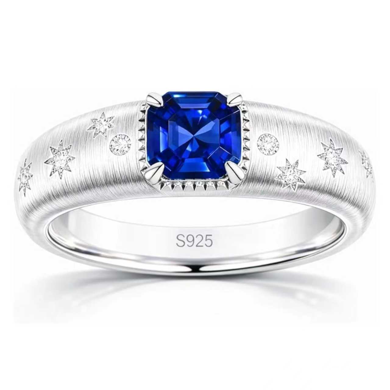 Starburst lab-grown blue sapphire ring with D-color moissanite accents in rhodium-plated 925 sterling silver
