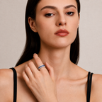 Model wearing the Blue Sapphire & Moissanite Curved Band Ring, showing its elegant blue sapphire sparkle and everyday styling.